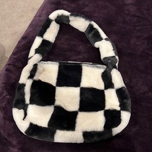 Gwen Stefani style purse. Fuzzy black and white checkered. Never used.